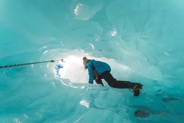 Picture of woman in ice cave on Franz Josef Glacier