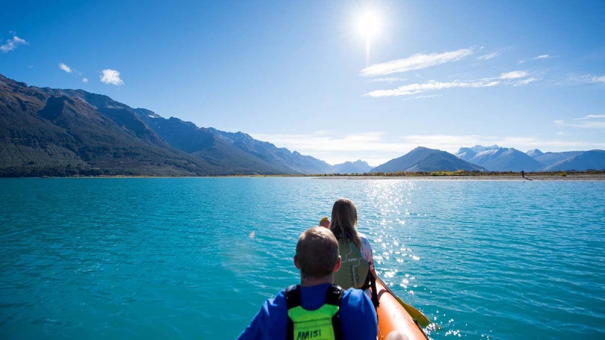 Two people in a twin kayak on Lake Wakatipu
