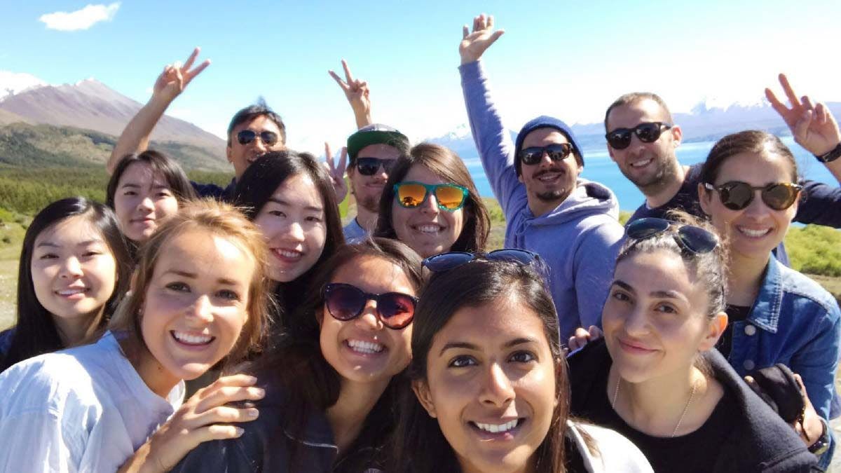 Group of people take a selfie together in New Zealand