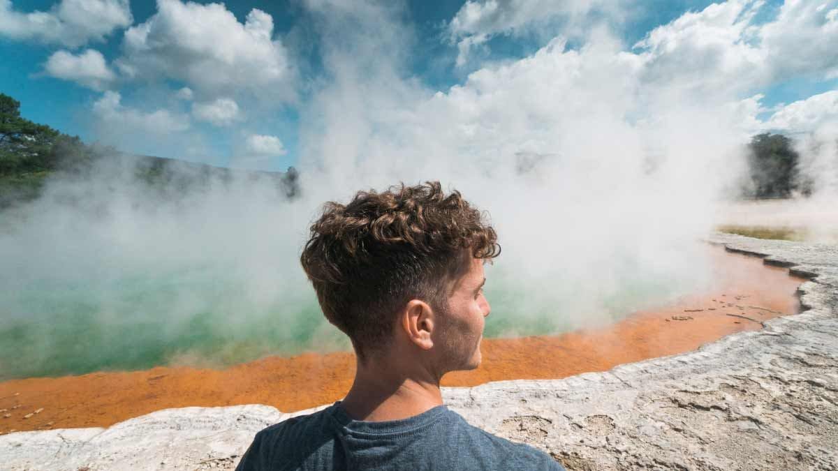 Man at Te Puia Geothermal Springs in New Zealand