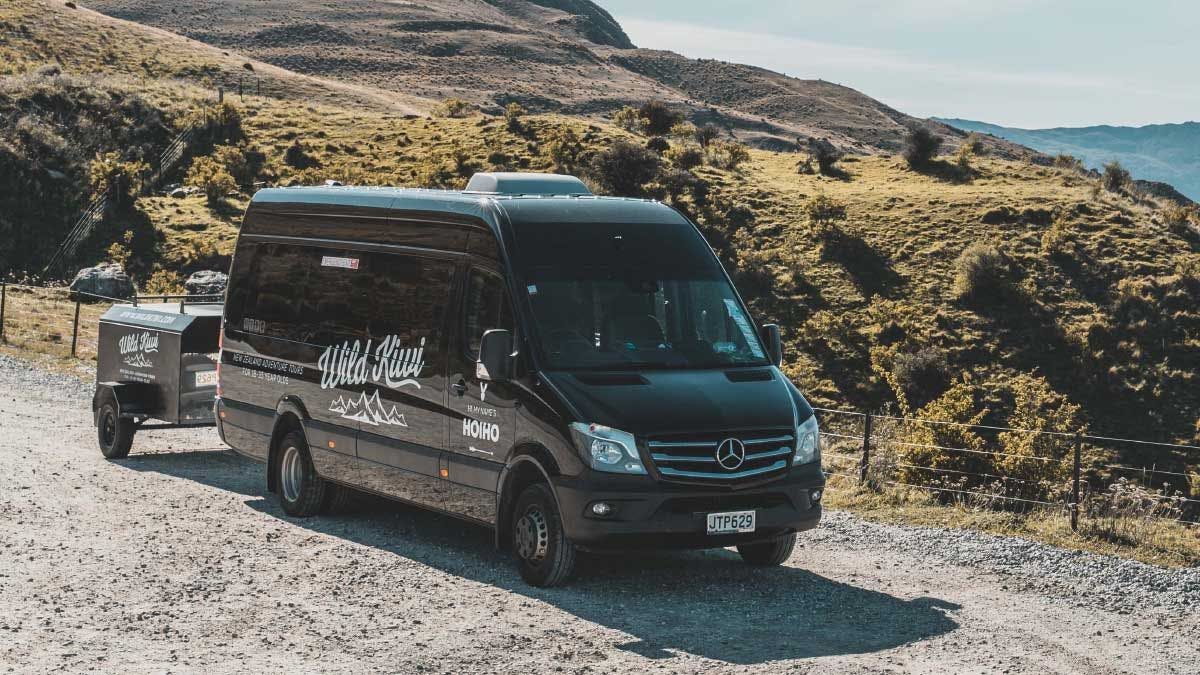 Wild Kiwi Mercedes Sprinter vehicle parked in the countryside