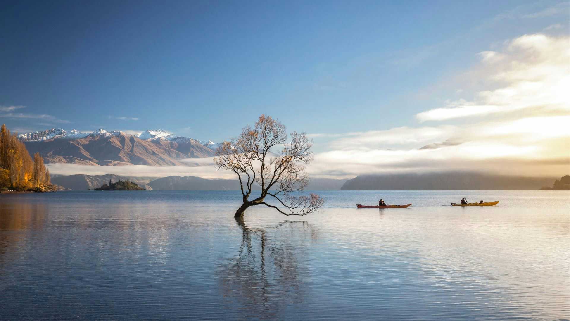 Two kayakers on Lake Wanaka in New Zealand