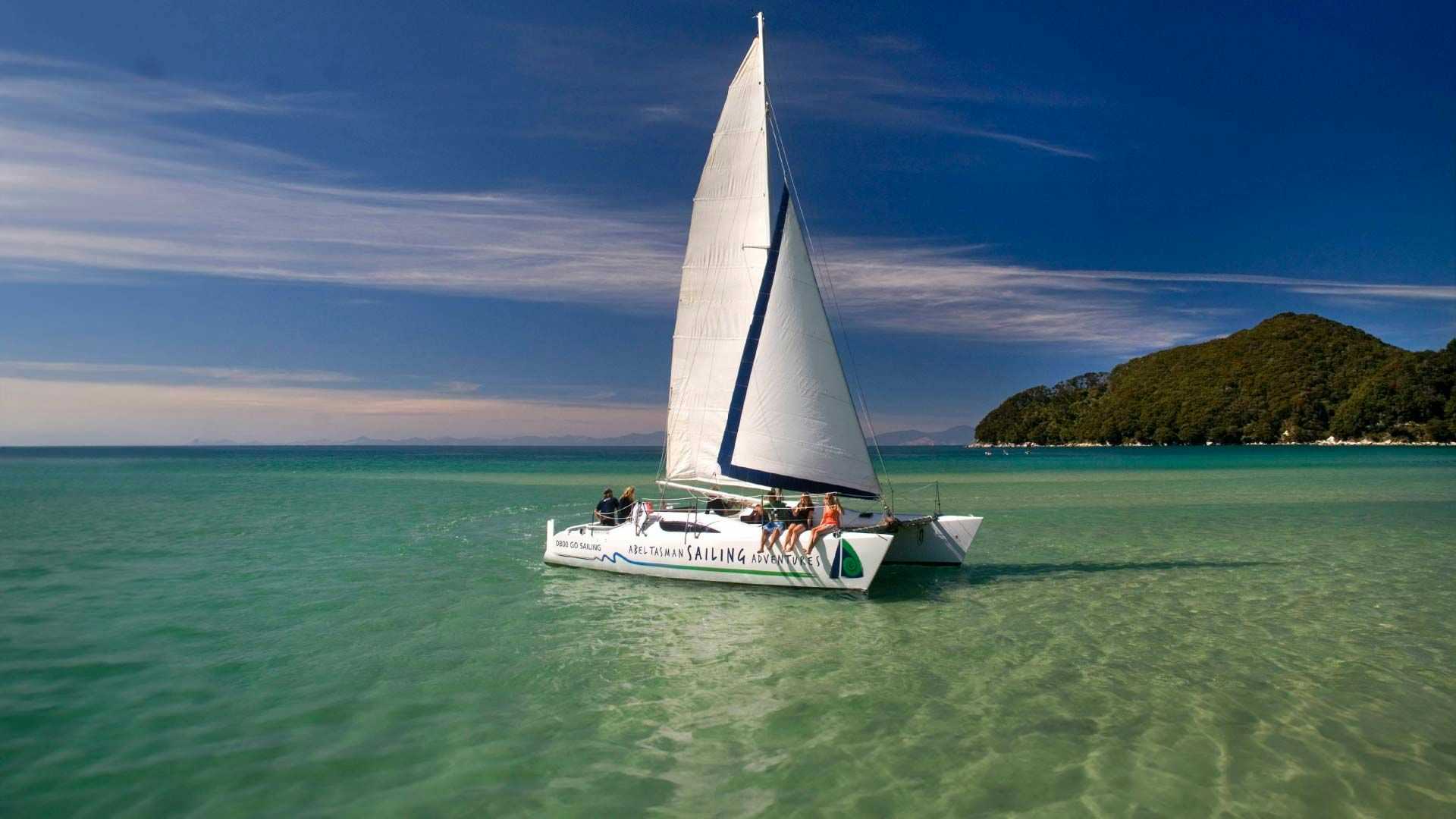 People on a yacht in Abel Tasman National Park