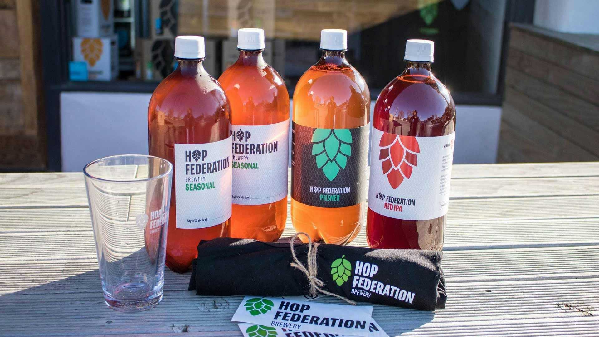 Line up of Hop Federation beer bottles