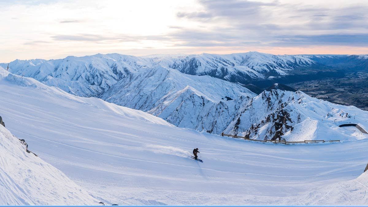 Person skiing down Coronet Peak