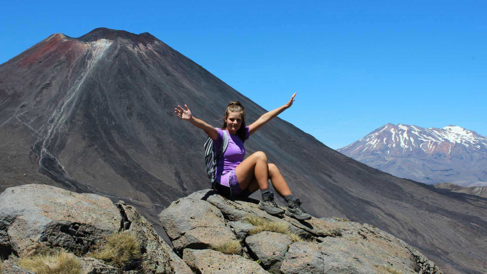 Woman posing for a photo on the Tongariro Crossing